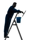 Worker cleaning window cleaner silhouette Royalty Free Stock Photo