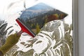 Worker cleaning window with squeegee, closeup. Picturesque mountains in autumn, view through clear glass Royalty Free Stock Photo