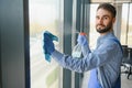 worker cleaning windows service on high rise building Royalty Free Stock Photo