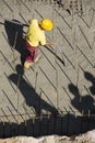 Worker on concrete background