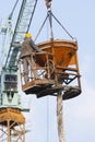 A worker in a concrete bucket Royalty Free Stock Photo