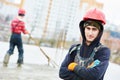 Worker during concrete work at costruction site