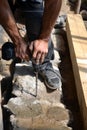 Worker of construction drilling  stone with a power drill. Royalty Free Stock Photo