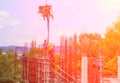 Worker construction team working on high floor building commercial in site workplace with sunrise light Royalty Free Stock Photo