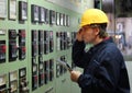 Worker in a Control Room Royalty Free Stock Photo