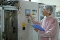 Worker Controls the Sugar Packing Machine Royalty Free Stock Photo