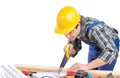 A worker cut a plank with a hand saw Royalty Free Stock Photo