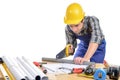 A worker cut a plank with a hand saw Royalty Free Stock Photo