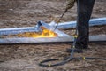 A worker cut steel beams using propane-oxygen torch..Oxy-fuel cutting Royalty Free Stock Photo