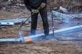 A worker cut steel beams using propane-oxygen torch..Oxy-fuel cutting Royalty Free Stock Photo