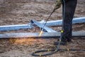 A worker cut steel beams using propane-oxygen torch..Oxy-fuel cutting Royalty Free Stock Photo