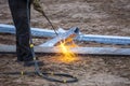 A worker cut steel beams using propane-oxygen torch..Oxy-fuel cutting Royalty Free Stock Photo