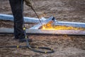 A worker cut steel beams using propane-oxygen torch..Oxy-fuel cutting Royalty Free Stock Photo