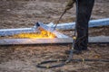 A worker cut steel beams using propane-oxygen torch..Oxy-fuel cutting Royalty Free Stock Photo