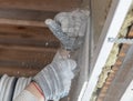 Worker cuts with a knife drywall repair Royalty Free Stock Photo