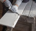 Worker cuts with a knife drywall repair Royalty Free Stock Photo