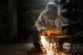 Heavy industry worker cutting steel with gas in workshop. Steel Workers welding, grinding, cutting in metal industry. Royalty Free Stock Photo