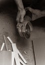 Worker cuts tiles with the angle grinder Royalty Free Stock Photo