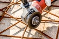 Worker cutting construction stee netl with Angle Grinder Mashin Royalty Free Stock Photo