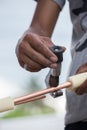 Worker cutting copper pipe of air conditioner Royalty Free Stock Photo