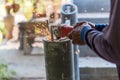 Worker cutting metal with grinder. Sparks while grinding iron. Electric wheel grinding on steel structure in factory. Sparks from Royalty Free Stock Photo