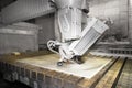 Worker cutting metal ,stone production,beautiful stone cutting Royalty Free Stock Photo