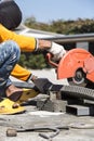 Worker cutting metal with unsafety position Royalty Free Stock Photo