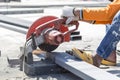 Worker cutting metal with unsafety position Royalty Free Stock Photo