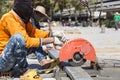 Worker cutting metal with unsafety position Royalty Free Stock Photo