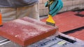 Worker cutting paving tiles for laying on the terrace Royalty Free Stock Photo