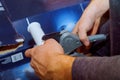 Worker cutting pvc pipe in construction site Royalty Free Stock Photo