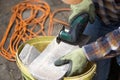 Worker cutting roof tiles with circular saw machine Royalty Free Stock Photo