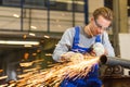 Worker cutting steel with angle grinder Royalty Free Stock Photo