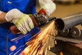 Worker cutting steel with angle grinder Royalty Free Stock Photo