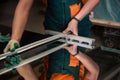 Worker cutting the surface of glass mirror