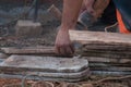 Worker cutting a tile using an angle grinder.Construction tool Royalty Free Stock Photo