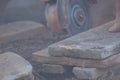 Worker cutting a tile using an angle grinder.Construction tool Royalty Free Stock Photo