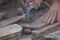 Worker cutting a tile using an angle grinder.Construction tool Royalty Free Stock Photo