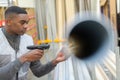 Worker in distribution warehouse with handheld barcode scanner Royalty Free Stock Photo