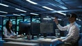 IT worker doing maintenance on server farm gear using virtual reality technology Royalty Free Stock Photo