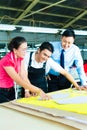 Worker, Dressmaker and CEO in a factory