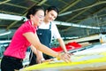 Worker and Dressmaker in a factory Royalty Free Stock Photo