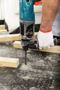 Worker drill holes. Royalty Free Stock Photo