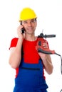 Worker with drilling machine is calling Royalty Free Stock Photo