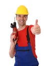 Worker with drilling machine and thumb up Royalty Free Stock Photo