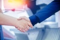 Worker engineer shaking hands with businessman at construction site background cnc control panel Royalty Free Stock Photo