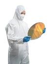 Worker or engineer wears medical protective suit or white coverall suit with silicon wafer Royalty Free Stock Photo