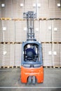 Worker Examining Stock At Warehouse