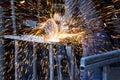 Worker Cutting Steel And making sparks fly