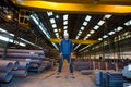 Worker in factory in stockroom